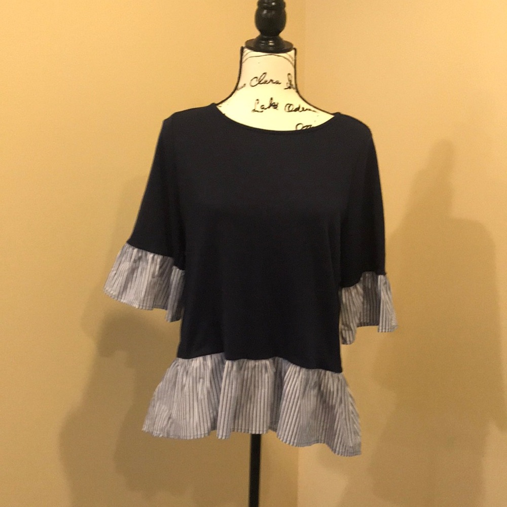Navy Sweater with under striped blouse